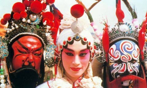 Three Beijing opera actors in masks and makeup 