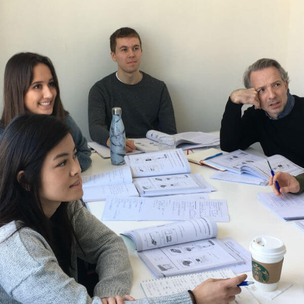 Four students learning Chinese in class in Shanghai